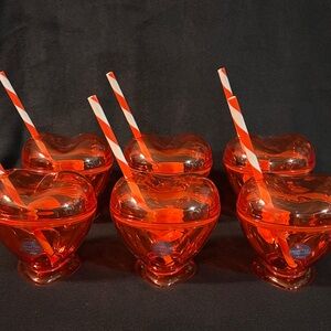 Red tumbler with straw